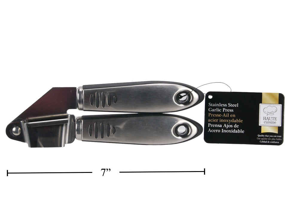 Stainless steel garlic press with a label on a white background
