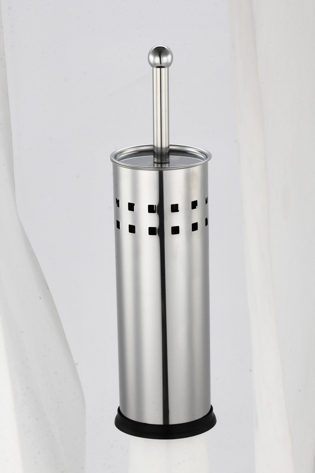 Stainless steel toilet brush with holder on a white background